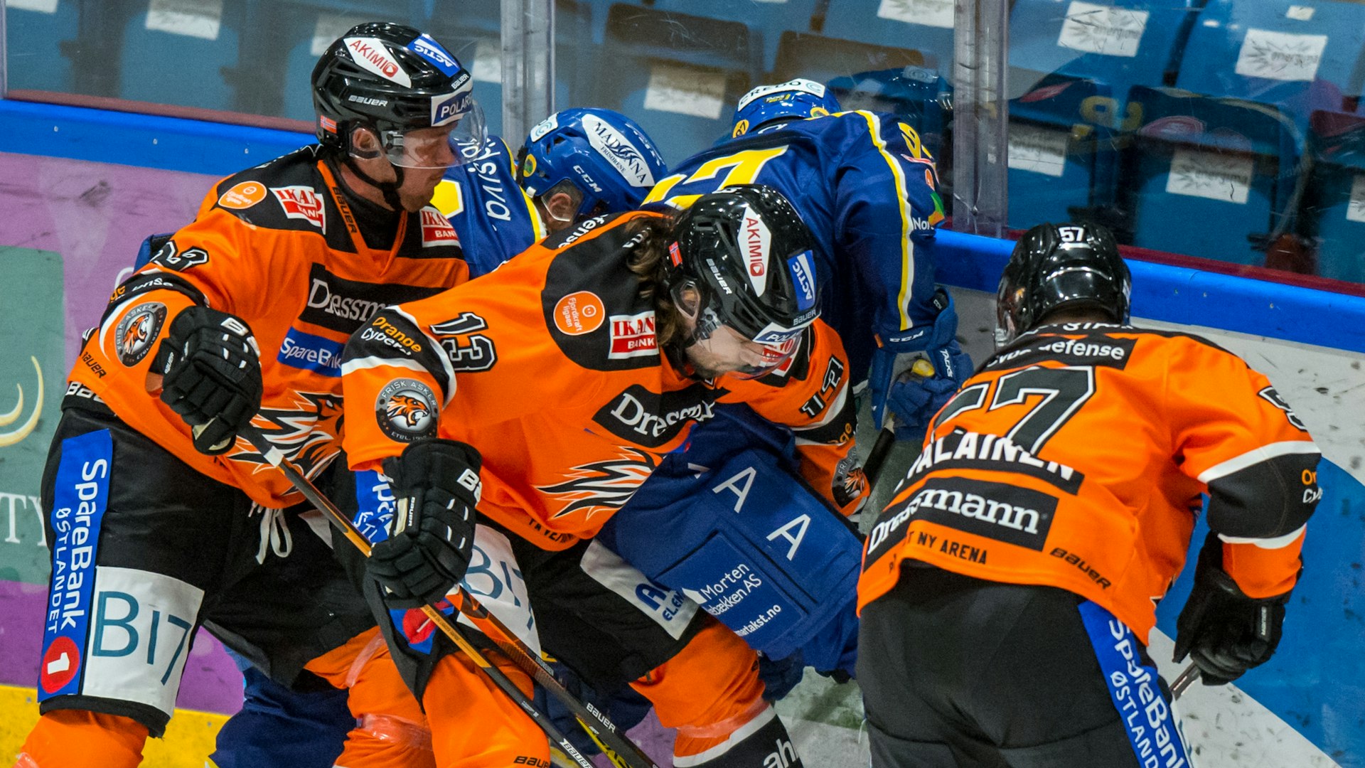 Nevalainen, Geheb og Andresen jager puck mot Storhamar.